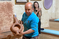 Potter with Vase